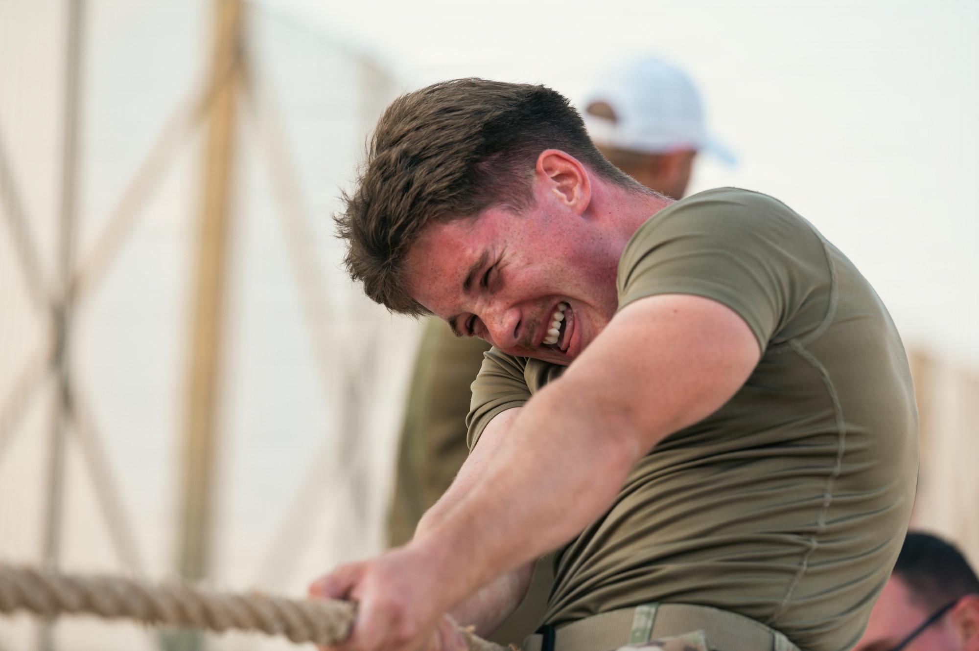 People compete in tug of war competition.