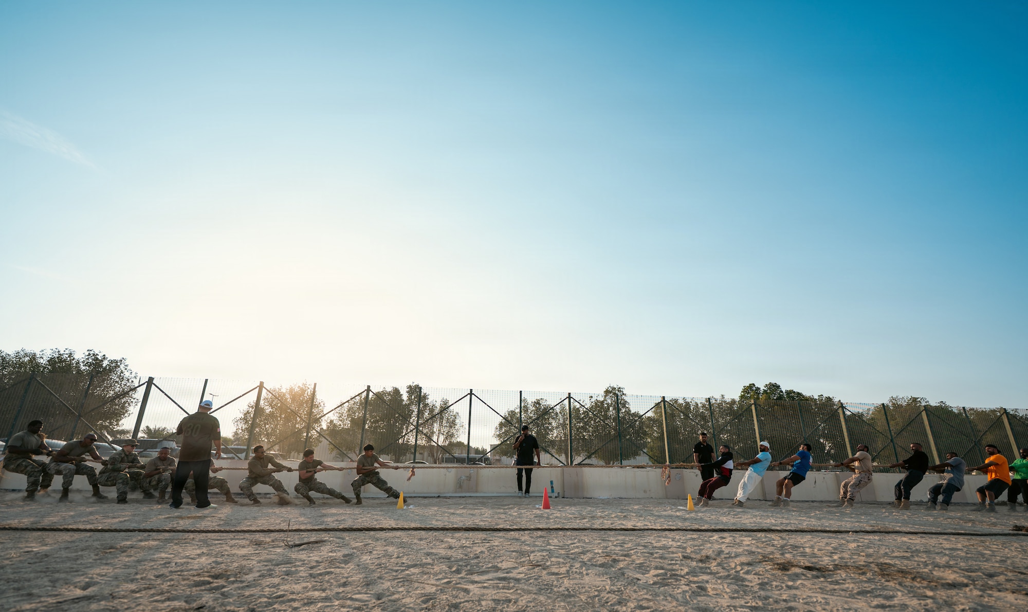People compete in tug of war competition.