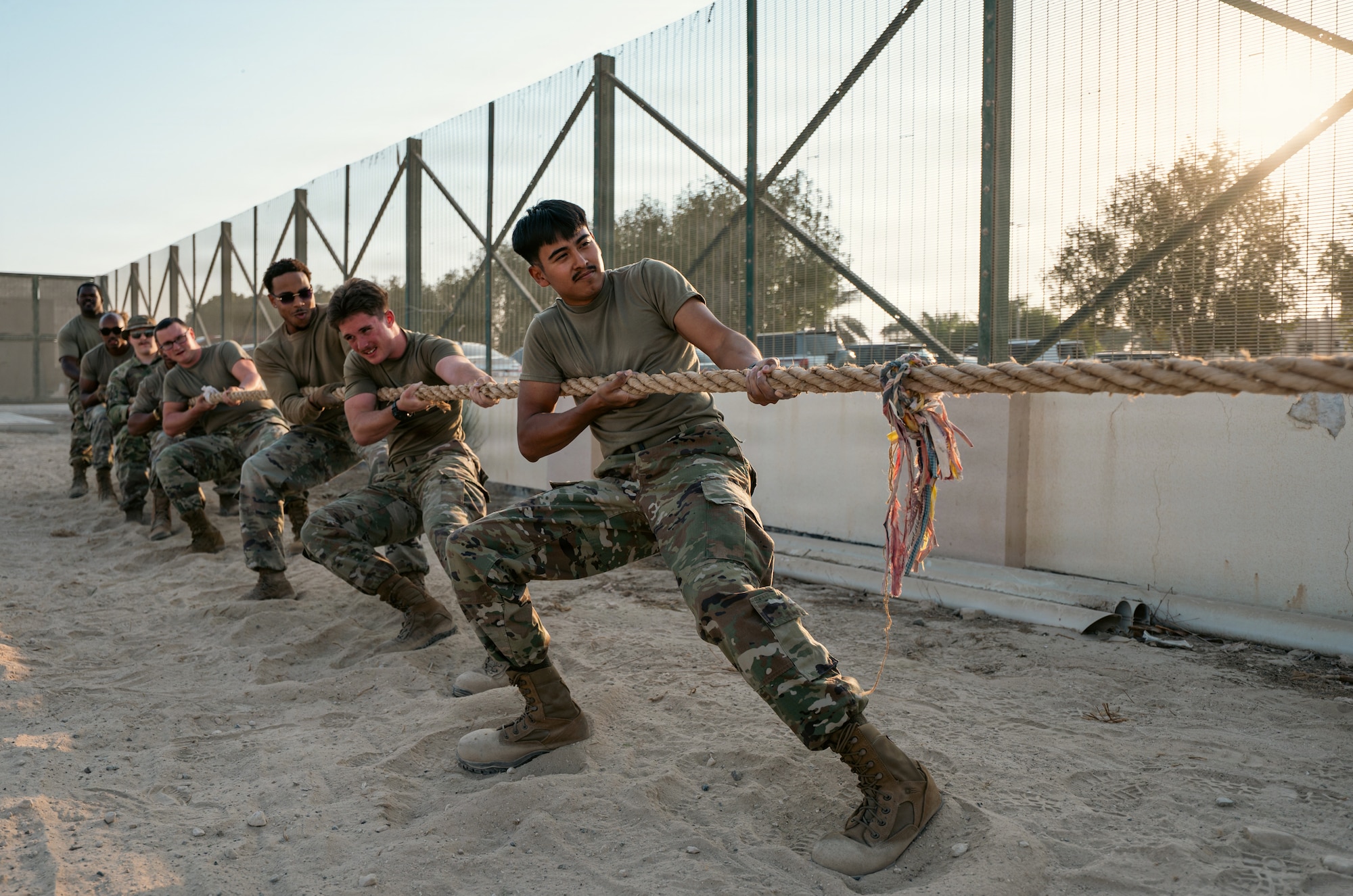People compete in tug of war competition.
