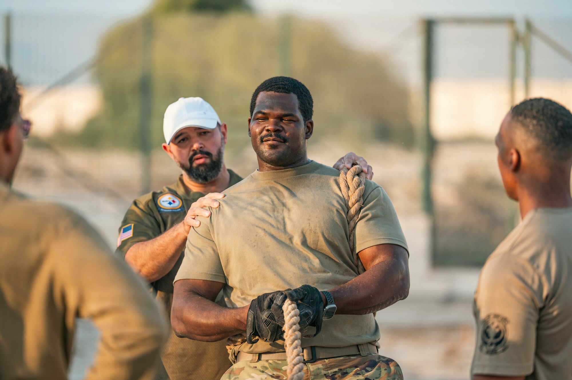 People compete in tug of war competition.