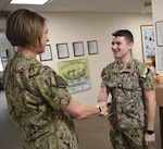 Behavioral Health Bravo Zulu… Capt. Karla Lepore, Navy Medicine Readiness Training Command Bremerton commanding officer congratulates Hospital Corpsman 2nd Class Cade Crenshaw, behavioral health technician assigned to the command’s Mental Health Directorate, with being named the Navy’s Behavioral Health Technician of the Year…shortly after he was also recognized as their Sailor of the Year (official Navy photo by Douglas H Stutz, NHB/NMRTC Bremerton public affairs officer).