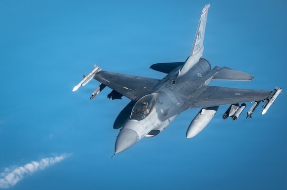 A U.S. Air Force F-16C Fighting Falcon flies during a mission providing defensive counter-air for U.S. Naval Forces Central Command operations in the U.S. Central Command area of responsibility, Nov. 18, 2025. The F-16C enables the U.S. military to achieve air superiority, support joint sea power, and maintain supply lines with overwhelming combat power. (U.S. Air Force photo by Senior Airman Jared Brewer)