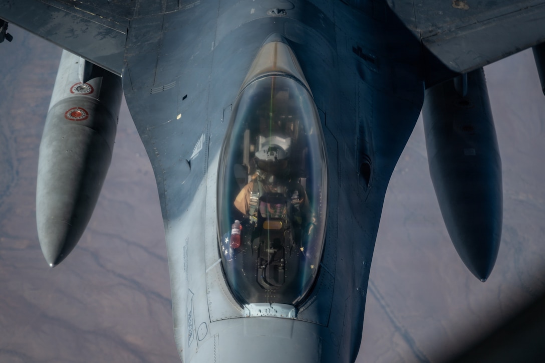 A U.S. Air Force F-16C Fighting Falcon refuels with a KC-135 Stratotanker over the U.S. Central Command area of responsibility, Nov. 18, 2025. The F-16C enables Air Force Central Command to preserve operational depth, stage joint forces, maintain supply lines and project overwhelming combat power. (U.S. Air Force photo by Senior Airman Jared Brewer)