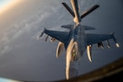 A U.S. Air Force F-16C Fighting Falcon prepares to refuel with a KC-135 Stratotanker during a mission providing defensive counter-air for U.S. Naval Forces Central Command operations in the U.S. Central Command area of responsibility, Nov. 18, 2025.  The F-16C enables the U.S. military to achieve air superiority, support joint sea power, and maintain supply lines with overwhelming combat power. (U.S. Air Force photo by Senior Airman Jared Brewer)