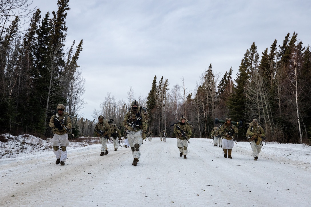 U.S. Army Soldiers with the 785th Military Police Battalion, 300th Military Police Brigade, 200th Military Police Command, practice and perform military police duties during the Joint Pacific Multinational Readiness Center’s 25-02 training exercise. The training provided approximately ten thousand joint and multinational service members with vital Arctic operational experience and cold weather tactics, techniques and procedures. (U.S. Army Photo by Master Sgt. Justin P. Morelli)