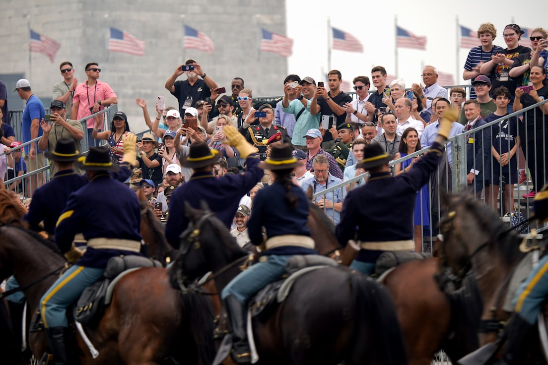 Soldiers wave to the crowd during the 250th Army Birthday Parade in Washington, D.C., June 14, 2025. (U.S. Army photo by Sgt. 1st Class Crystal Harlow)