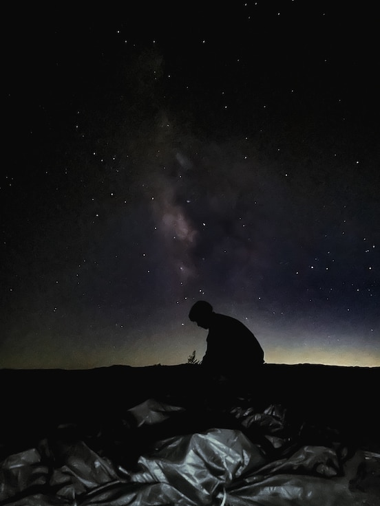 U.S. Army paratroopers assigned to the National Training Center, Operations Group, Tarantula Team, perform nighttime airborne operations at Calvin Drop Zone, Fort Irwin, Ca., Sept. 23, 2025. NTC conducted its final airborne operations that day, having been a key site for airborne training and readiness since 1987. (U.S. Army photo by Sgt. Kelsey Kollar)
