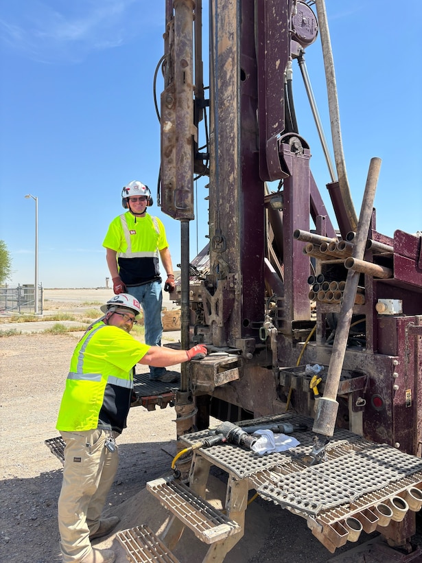 Senior driller, Chris Bean (left) and lead driller, Dallas Spencer ready their equipment for the next round of drilling.