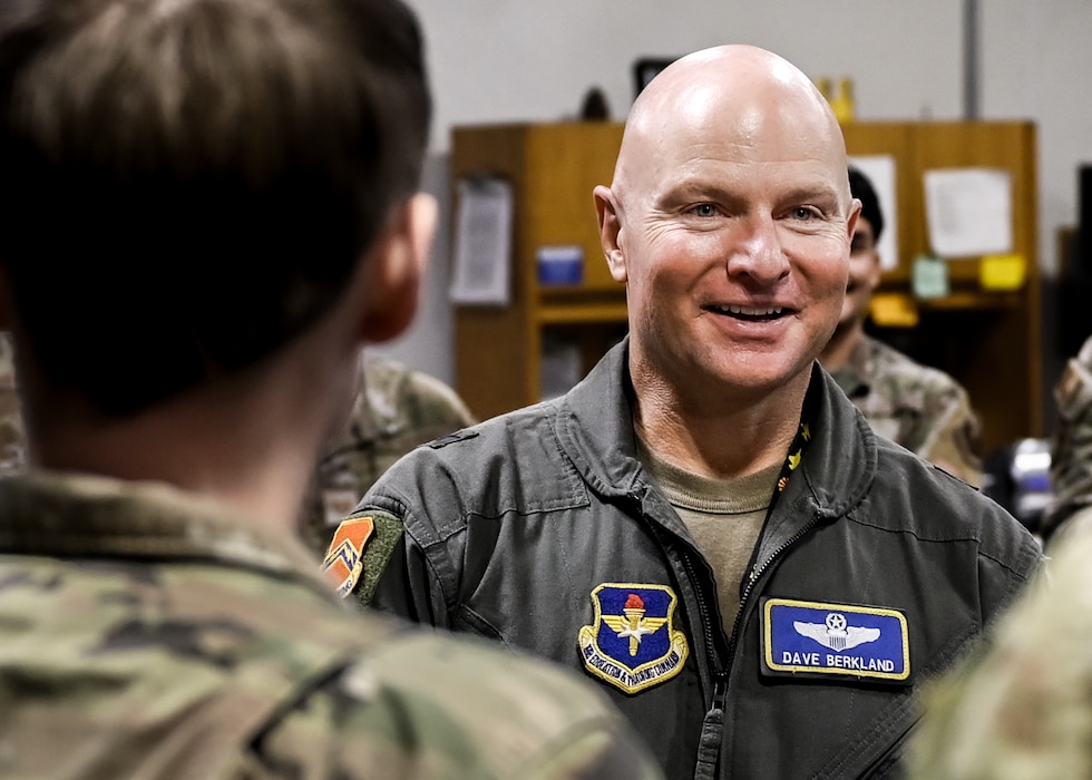 U.S. Air Force Brig. Gen. David Berkland, 56th Fighter Wing commander, greets airmen assigned to the 56th Aircraft Maintenance Squadron