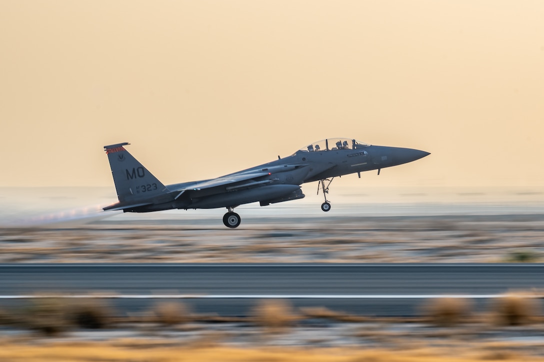A U.S. Air Force F-15E Strike Eagle aircraft lifts off the runway during exercise Marauder Shield 26.1 within the U.S. Central Command area of responsibility, Nov. 11, 2025. The exercise focused on integrated Kuwaiti Command and Control systems, shaping regional airspace management and facilitating joint operations. This enhanced command and control integration paved the way for more effective Agile Combat Employment strategies, allowing for rapid deployment and flexible response to emerging threats.

 (U.S. Air Force photo by Staff Sgt. Tylin Rust)