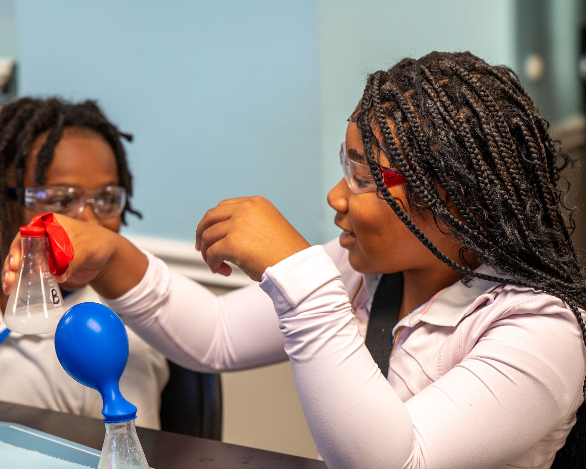 Students collaborate on a hands-on chemistry experiment during a STARBASE Maxwell session at Maxwell Air Force Base, Alabama, Oct. 8, 2025.
