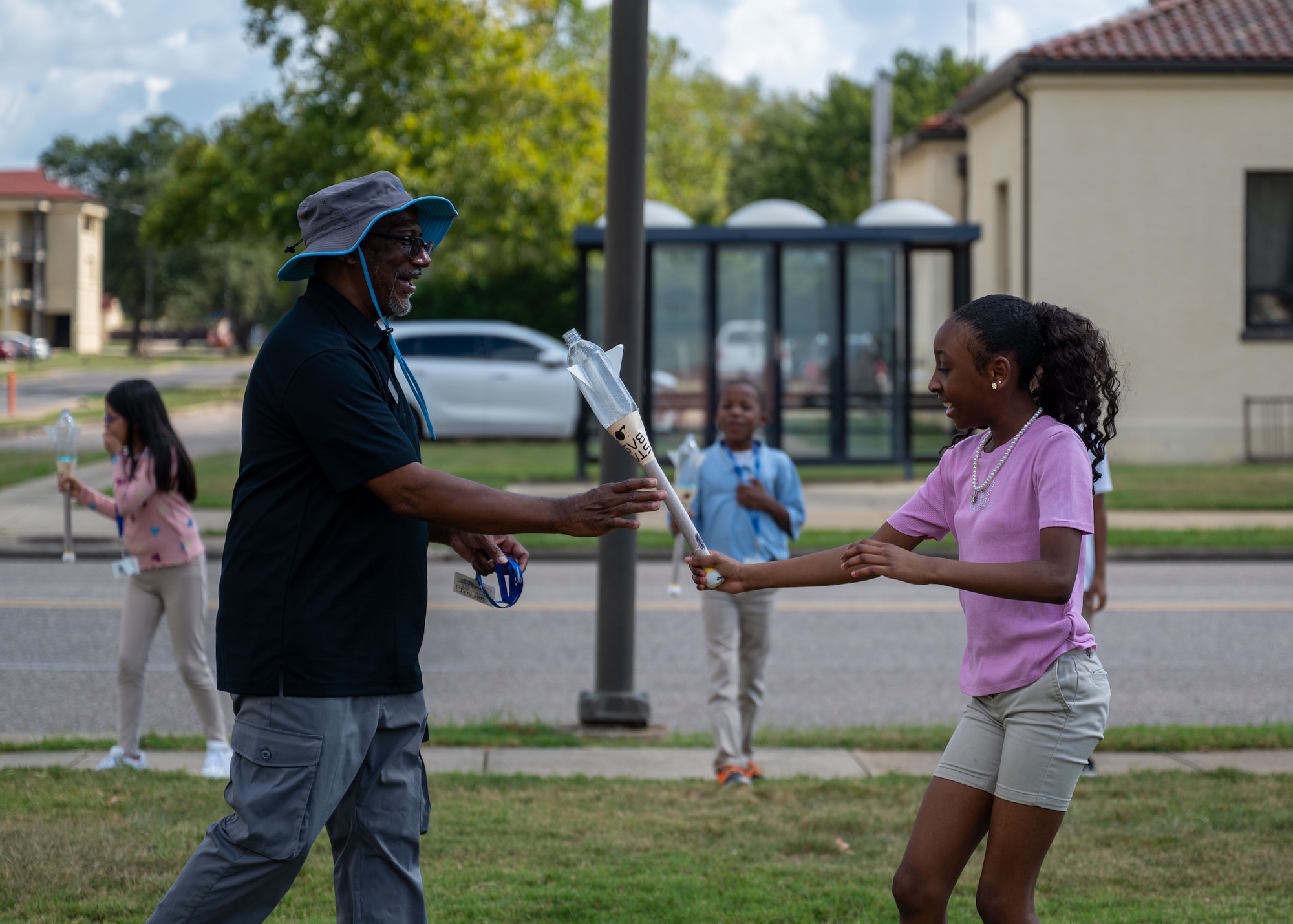 Darrin Roberson, STARBASE Maxwell instructor, assists a student with a rocket launch during a lesson at Maxwell Air Force Base, Alabama, Oct. 8, 2025.