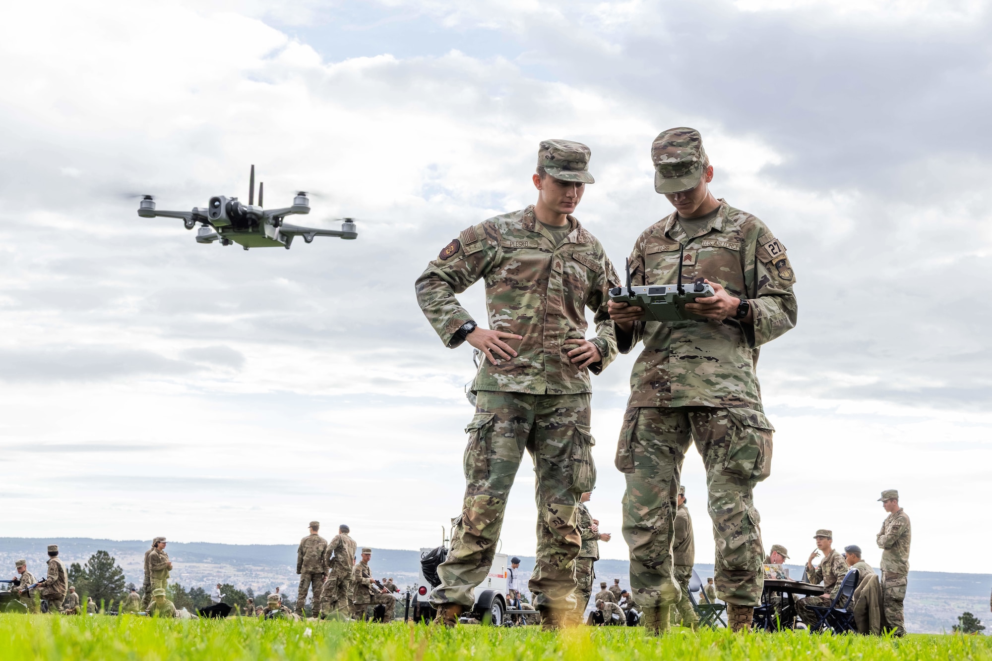 Photo of cadets piloting a Small Unmanned Aircraft System outdoors