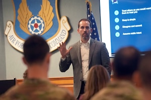 Gordon Kordyak gives a presentation during the Department of the Air Force’s Program Executive Office for Command, Control, Communications and Battle Management all-call, here, May 1, 2025. Kordyak spoke to Airmen, government civilians and contractors about a range of topics centered around the work of C3BM and its divisions. Kordyak is the C3BM deputy PEO. (Official Air Force Photo by Richard Blumenstein).