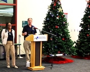 Darin Funk, the incoming executive director of American Gold Star Families, Inc., thanks the organization's president, Frances Maddox, during the American Gold Star Families’ Fallen Heroes Tree of Honor Tree Lighting Ceremony.