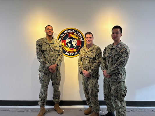 251001-N-N1574-1001 PORTSMOUTH, Va. (Oct. 1, 2025) Sailors assigned to the Mercy-class hospital ship USNS Comfort (T-AH 20) and Naval Medical Forces Atlantic, gather for a photo on board, Mon., Day, 2025. The group directed a Get Real Get Better project aboard the USS Comfort. Left to Right:  Hospital Corpsman 1st Class Charles Nallie Jr, assigned to Naval Medical Forces Atlantic, Hospital Corpsman 2nd Class Cody Budd, Hospital Corpsman 2nd Class Malachy Ng, both assigned to the Mercy-class hospital ship USNS Comfort (T-AH 20). (U.S. Navy Courtesy Photo)