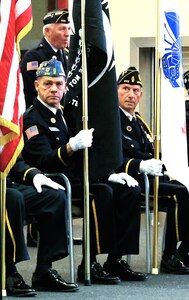 A color guard from American Legion Post 635 in Normal and Post 56 in Bloomington with Veterans of Foreign Wars Post 454 in Bloomington retires the colors.