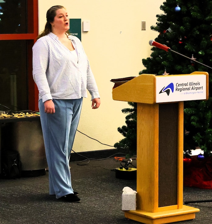 Kallie Bundy-Alzamora sings the National Anthem during the American Gold Star Families’ Fallen Heroes Tree of Honor Tree Lighting Ceremony