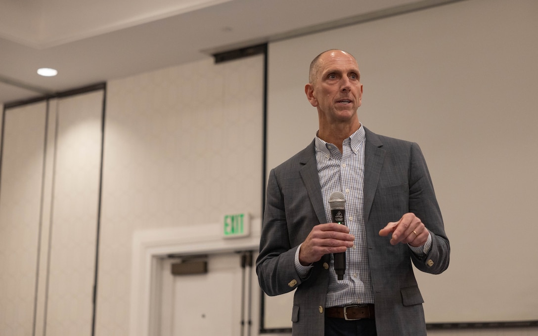 U.S. Marine Corps Brig. Gen. David K. Winnacker, commanding general, Force Headquarters Group, Marine Forces Reserve, delivers remarks during a town hall meeting with the Marine Innovation Unit in White Plains, New York, Nov. 20, 2025. During the town hall, Winnacker and Sergeant Major Russell D. Boley delivered remarks and answered questions from the Marine Innovation Unit. Established in 2022, the Marine Innovation Unit leverages the talent of the Marine Corps Reserve to accelerate the adoption of advanced capabilities, transform Naval Service capacity for technology employment, and retain and invest in Total Force human capital. (U.S. Marine Corps photo by Cpl. Kanoa Thomas)