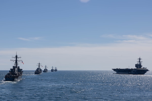 Six Arleigh Burke-class guided-missile destroyers prepare for a live fire shoot during the Titans of the Sea Presidential Review aboard the Nimitz-class aircraft carrier USS George H.W. Bush (CVN 77). The Titans of the Sea Presidential Review is one of many events taking place throughout the country to showcase maritime capabilities as part of the U.S Navy’s 250th birthday. America is a maritime nation. For 250 years, America’s Warfighting Navy has sailed the globe in defense of freedom.