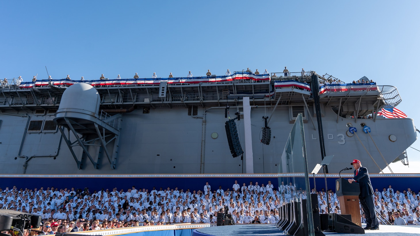President Donald J. Trump addresses nearly 15,000 Sailors from Norfolk-based commands and guests during an All-Hands Call at Pier 14, alongside the Nimitz-class aircraft carrier USS Harry S. Truman (CVN 75) and the Wasp-class amphibious assault ship USS Kearsarge (LHD 3), Oct. 5, 2025. The All-Hands Call at Naval Station Norfolk is one of many events taking place throughout the country to showcase the men and women who proudly serve in the U.S. Navy.