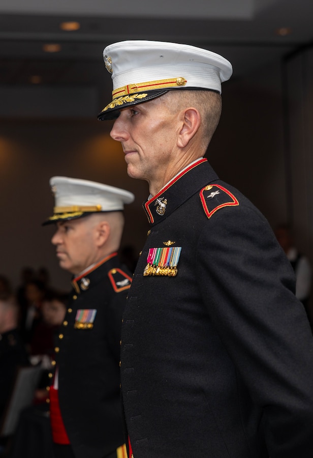 U.S. Marine Corps Brig. Gen. David K. Winnacker, right, commanding general, Force Headquarters Group, Marine Forces Reserve, and Col. Brooks D. Braden, commanding officer, Marine Innovation Unit, Force Headquarters Group, Marine Forces Reserve, stand at attention during the Marine Innovation Unit’s 250th Marine Corps Birthday Ball in White Plains, New York, Nov. 21, 2025. The birthday ball took place at the conclusion of MIU’s annual week-long training period, establishing objectives and plans for the coming year. Established in 2022, the MIU leverages the talent of the Marine Corps Reserve to accelerate the adoption of advanced capabilities, transform Naval Service capacity for technology employment, and retain and invest in Total Force human capital. (U.S. Marine Corps photo by Cpl. Kanoa Thomas)