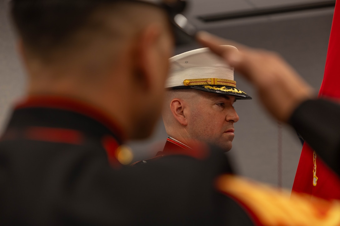 Master Gunnery Sergeant David A. Arellano salutes as Col. Brooks D. Braden, right, relinquishes command of the Marine Innovation Unit during a change of command ceremony in White Plains, New York, Nov. 21, 2025. During the ceremony, Col. Benjamin C. Richardson assumed command of the Marine Innovation Unit from Colonel Braden. Established in 2022, the Marine Innovation Unit leverages the talent of the Marine Corps Reserve to accelerate the adoption of advanced capabilities, transform Naval Service capacity for technology employment, and retain and invest in Total Force human capital. (U.S. Marine Corps photo by Cpl. Kanoa Thomas)