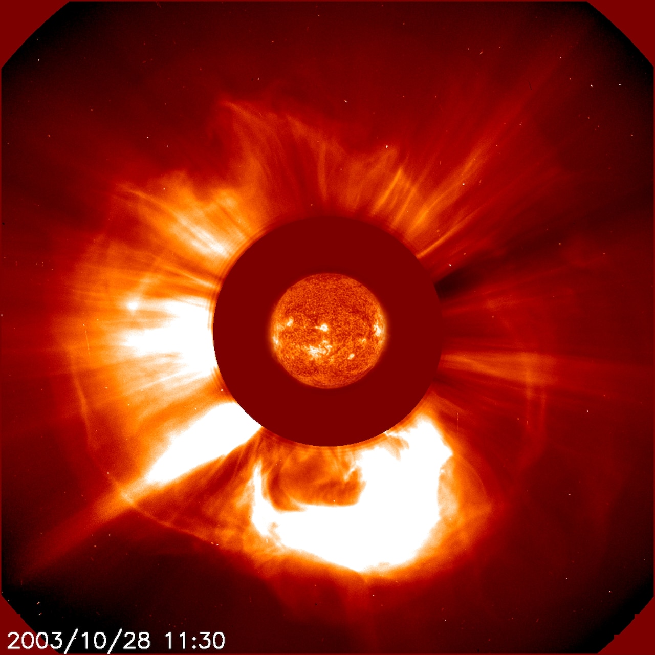 LASCO captures a large coronal mass ejection (CME) from the European Space Agency (ESA) and NASA’s joint Solar and Heliospheric Observatory (SOHO) satellite, Oct. 28, 2003.