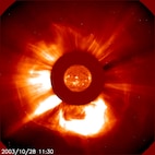 LASCO captures a large coronal mass ejection (CME) from the European Space Agency (ESA) and NASA’s joint Solar and Heliospheric Observatory (SOHO) satellite, Oct. 28, 2003.