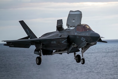 U.S. 7TH FLEET AREA OF RESPONSIBILITY (Nov. 28, 2025) — An F-35B Lighting II, assigned to Marine Fighter Attack Squadron 242, lands on the flight deck during flight operations aboard the forward-deployed amphibious assault carrier USS Tripoli (LHA...