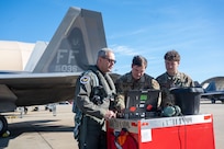 Airmen perform preflight chief on an aircraft.