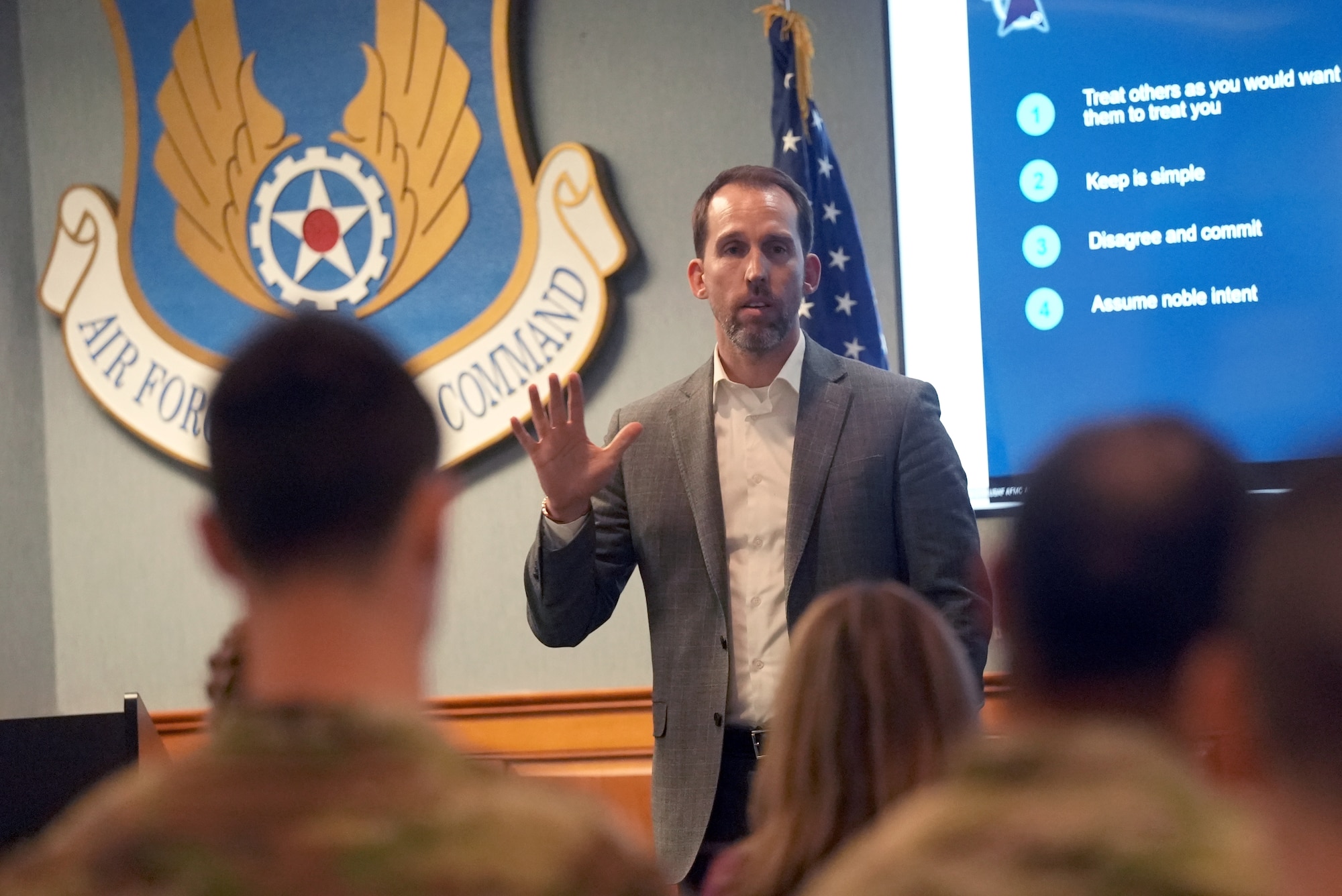 Gordon Kordyak gives a presentation during the Department of the Air Force’s Program Executive Office for Command, Control, Communications and Battle Management all-call, here, May 1, 2025. Kordyak spoke to Airmen, government civilians and contractors about a range of topics centered around the work of C3BM and its divisions. Kordyak is the C3BM deputy PEO. (Official Air Force Photo by Richard Blumenstein).