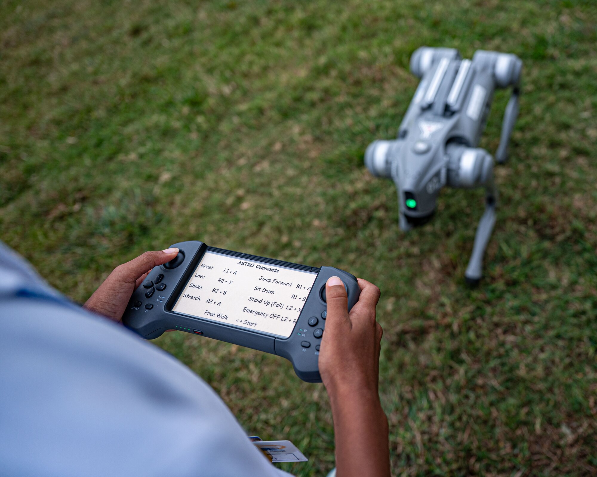 A student operates STARBASE Maxwell’s robotic dog using a remote control during a robotics lesson at Maxwell Air Force Base, Alabama, Oct. 9, 2025.