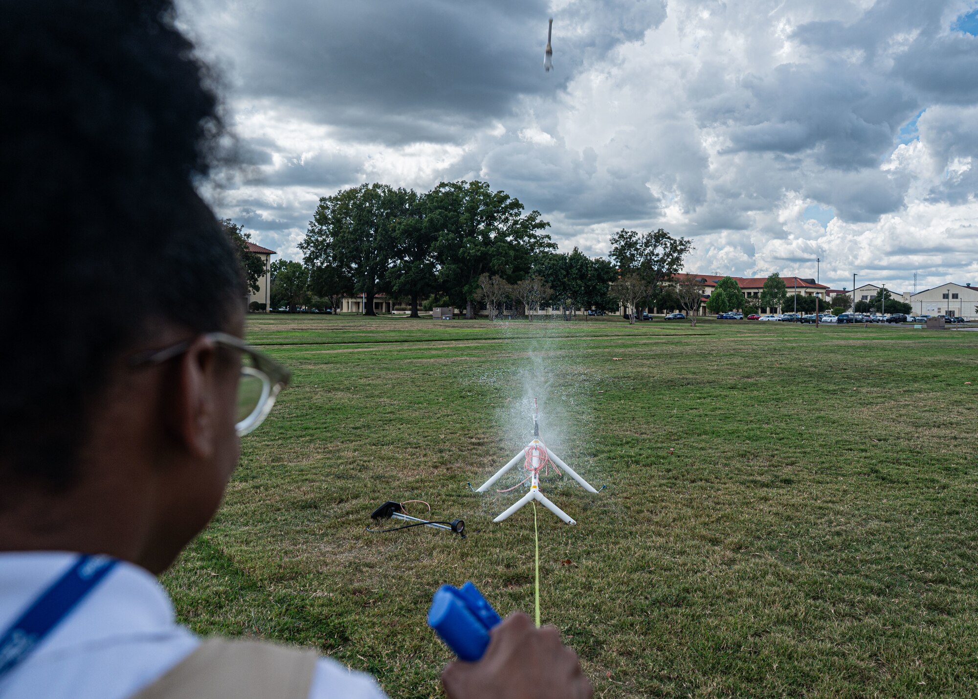 A student launches a model water rocket during an outdoor activity as part of a STARBASE Maxwell session at Maxwell Air Force Base, Alabama, Oct. 8, 2025.