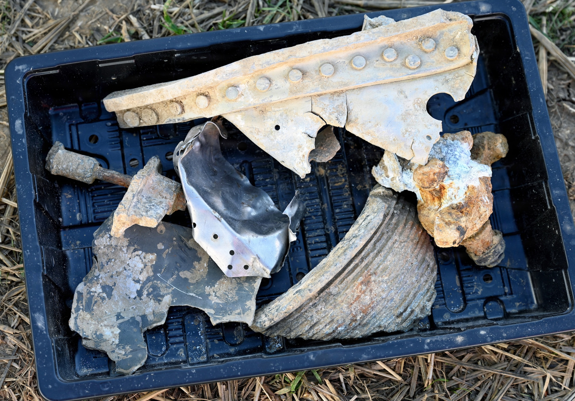 The finds were discovered by archaeologists and volunteers in partnership with the Defense POW/MIA Accounting Agency. Volunteers from the U.S. Air Force, U.S. Army, Canada and the Ministry of Defence’s Operation Nightingale program, together with the local community members, worked together over a six-week period to investigate the crash site of World War II U.S. Army Air Forces pilot, 2nd Lt. Lester Lowry, and his aircraft.