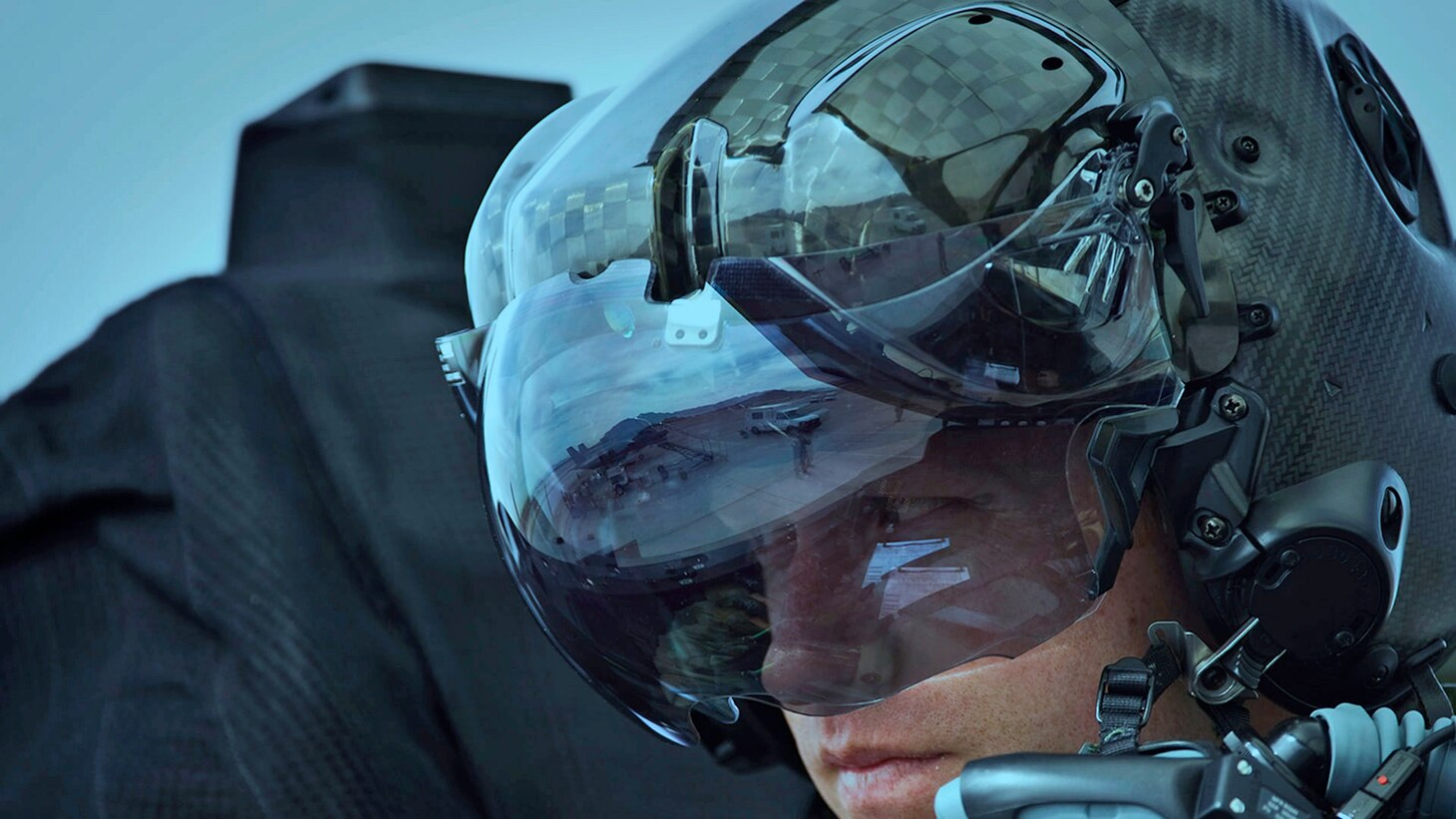 A crewman wearing an F-35 Gen III Helmet-Mounted Display System.
