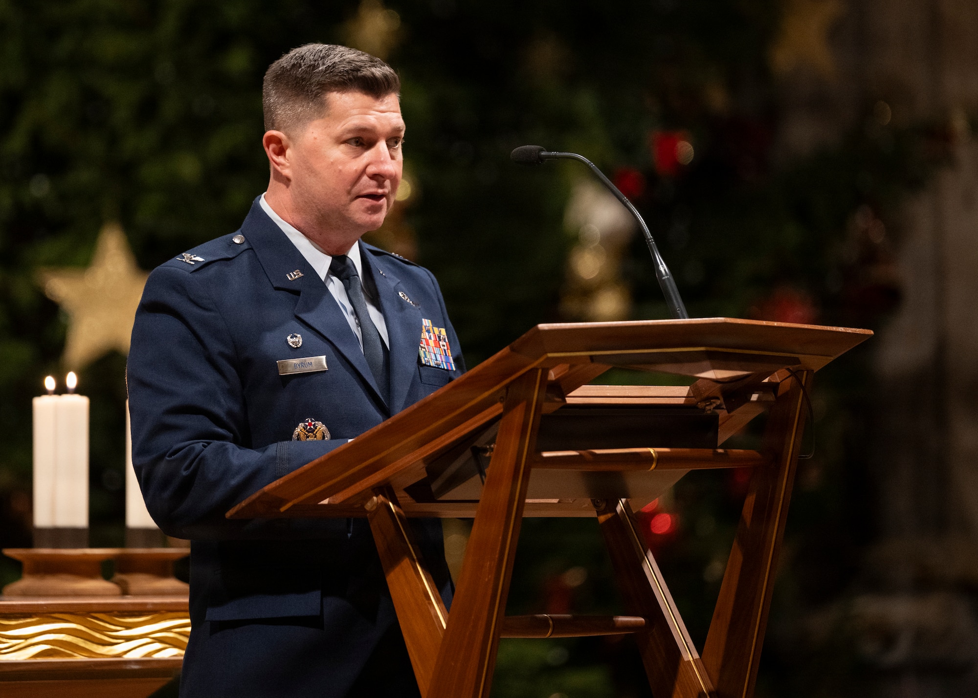 Col. Steven Byrum, 100th Air Refueling Wing commander, speaks to the gathered assembly at Ely Cathedral, Nov. 26, 2025. Ely Cathedral has partnered with the tribase area for the past 39 years to host a traditional service for U.S. service members during the Thanksgiving holiday. (U.S. Air Force photo by Staff Sgt. Nash Truitt)