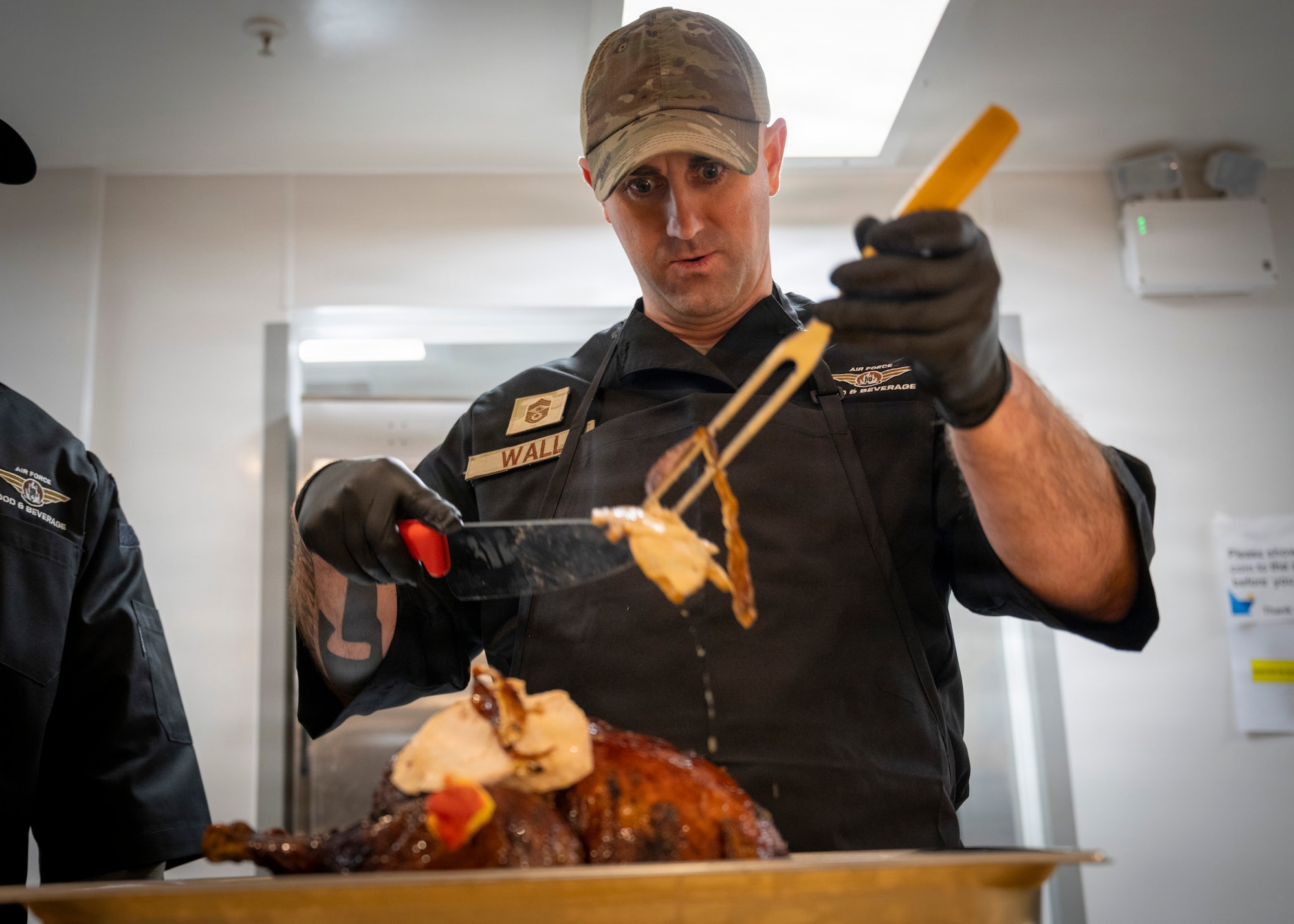 Command Chief Wall serves turkey.