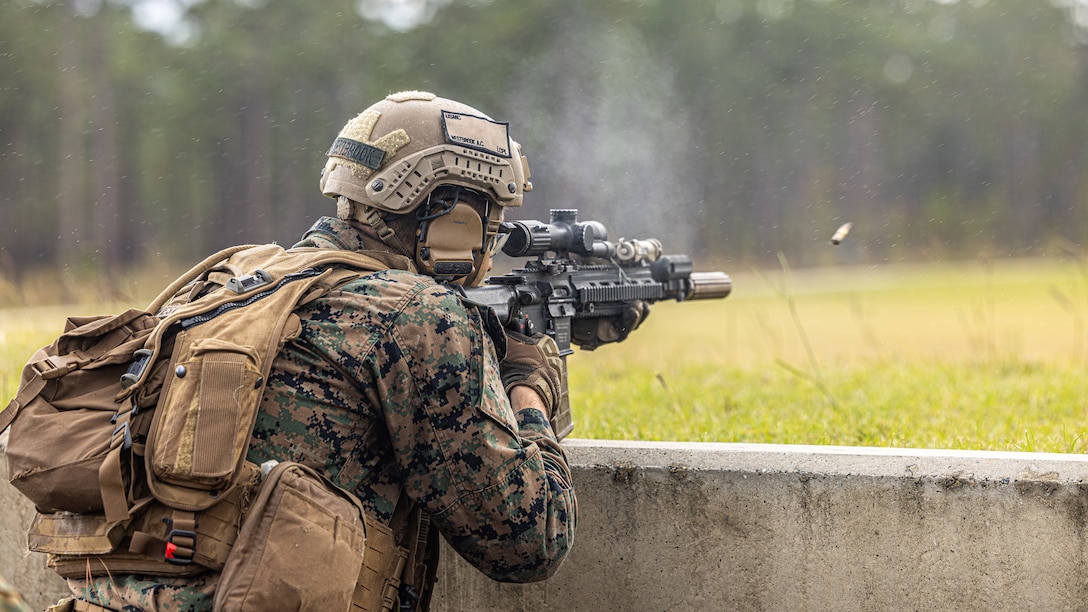 U.S. Marine Corps Lance Cpl. Adam Westbrook, a machine gunner with 2nd Battalion, 8th Marines, 2nd Marine Division, fires an M27 Infantry Automatic Rifle during a live fire exercise as part of a Marine Corps Combat Readiness Evaluation on Marine Corps Base Camp Lejeune, North Carolina, Nov. 3, 2025.