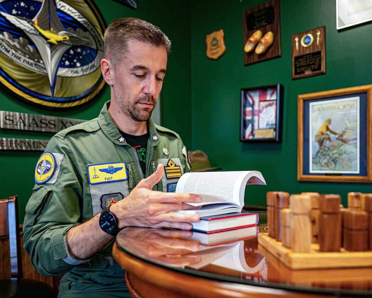 Italian Air Force Lt. Col. Emanuele Fumanti, 36° Wing XII Fighter Squadron, School of Advanced Air and Space Studies student, reads course material at Maxwell Air Force Base, Alabama, Oct. 23, 2025.