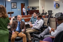 DAHLGREN, Va. – The Naval Surface Warfare Center Dahlgren Division team collaborated for six hours at Kitty Hawk Technologies during the International Mission Engineering Hackathon to complete their challenge. (U.S. Navy Photo by Dorina Watermolen)