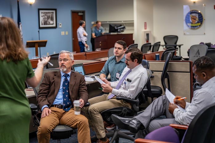 DAHLGREN, Va. – The Naval Surface Warfare Center Dahlgren Division team collaborated for six hours at Kitty Hawk Technologies during the International Mission Engineering Hackathon to complete their challenge. (U.S. Navy Photo by Dorina Watermolen)