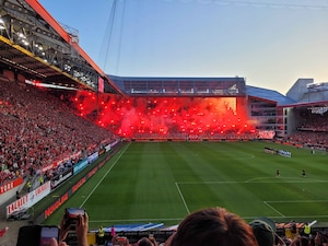 Members from the 184th wing attend a German soccer game.