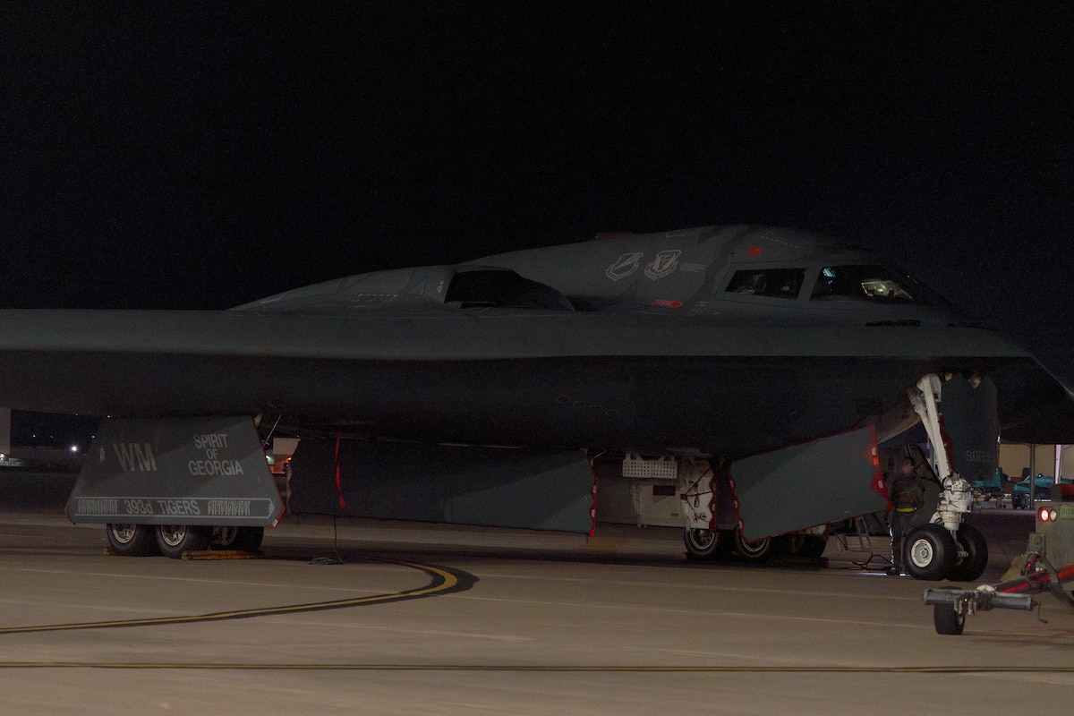 A U.S. Air Force B-2 Spirit, “Spirit of Georgia,” aircraft parks by a hangar at Whiteman Air Force Base, Missouri, Nov. 6th, 2025. The “Spirit of Georgia,” was damaged in an aircraft incident in September of 2021 and has recently returned to the fleet. (U.S. Air Force photo by Senior Airman Robert E. Hicks)