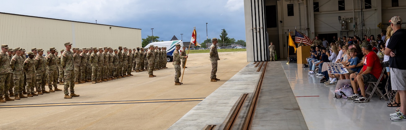 Soldiers from Troop A, 2nd Squadron, 106th Cavalry Regiment, stand in formation during their welcome home ceremony.