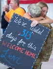 Soldiers from Troop A, 2nd Squadron, 106th Cavalry Regiment, receive an emotional welcome home from family following an overseas deployment..