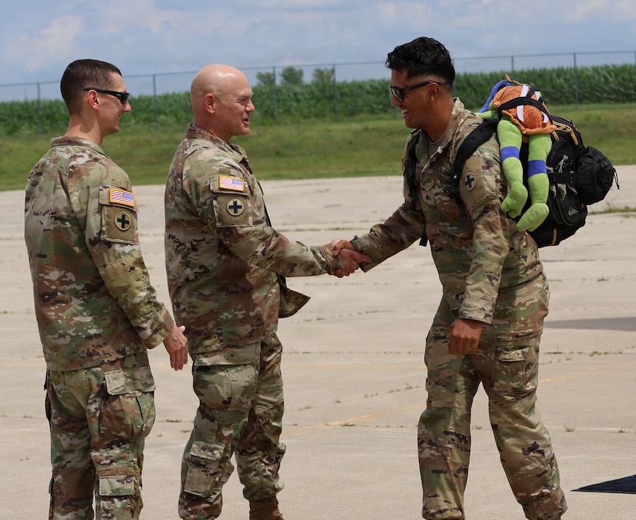Col. Seth Hible, Commander, 33rd Infantry Brigade Combat Team, welcomes home Soldiers from Troop A, 2nd Squadron, 106th Cavalry Regiment.