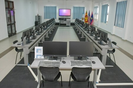 Photo of a language lab with desks and computers