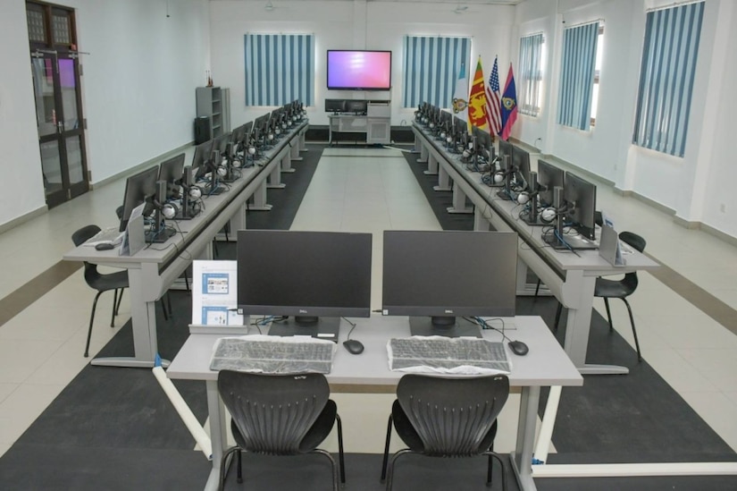 Photo of a language lab with desks and computers