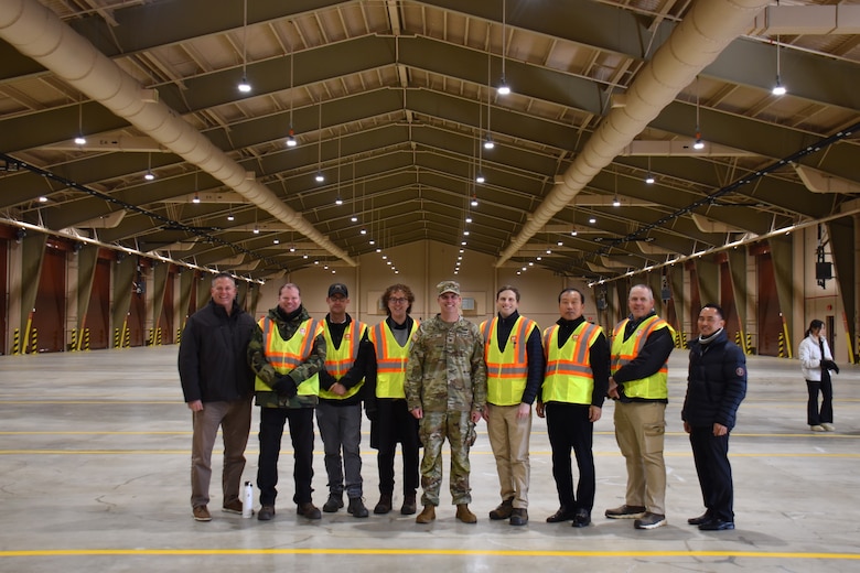 Some of the members of the Project Delivery Team from the U.S. Army Corps of Engineers – Far East District attending a ribbon cutting for the construction of the Airfield Damage Repair warehouse on Osan Air Base, South Korea, Dec. 3, 2025.